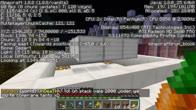 en medio de los bloques con cristal verde encima