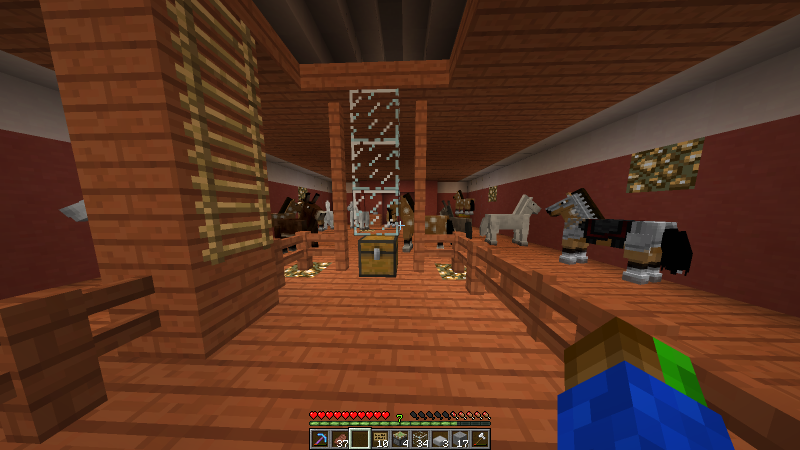 establo, con caballos burros, cerdos con sillas...