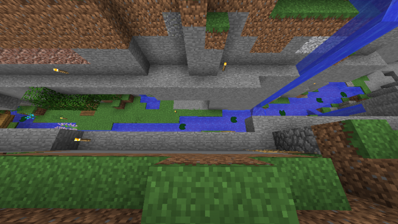 Esto era pura piedra y menas, y lo cambie a hierba, y más tarde, agua para que se viera más natural, y como pueden ver, no es tan grande (13 bloques de profundidad).